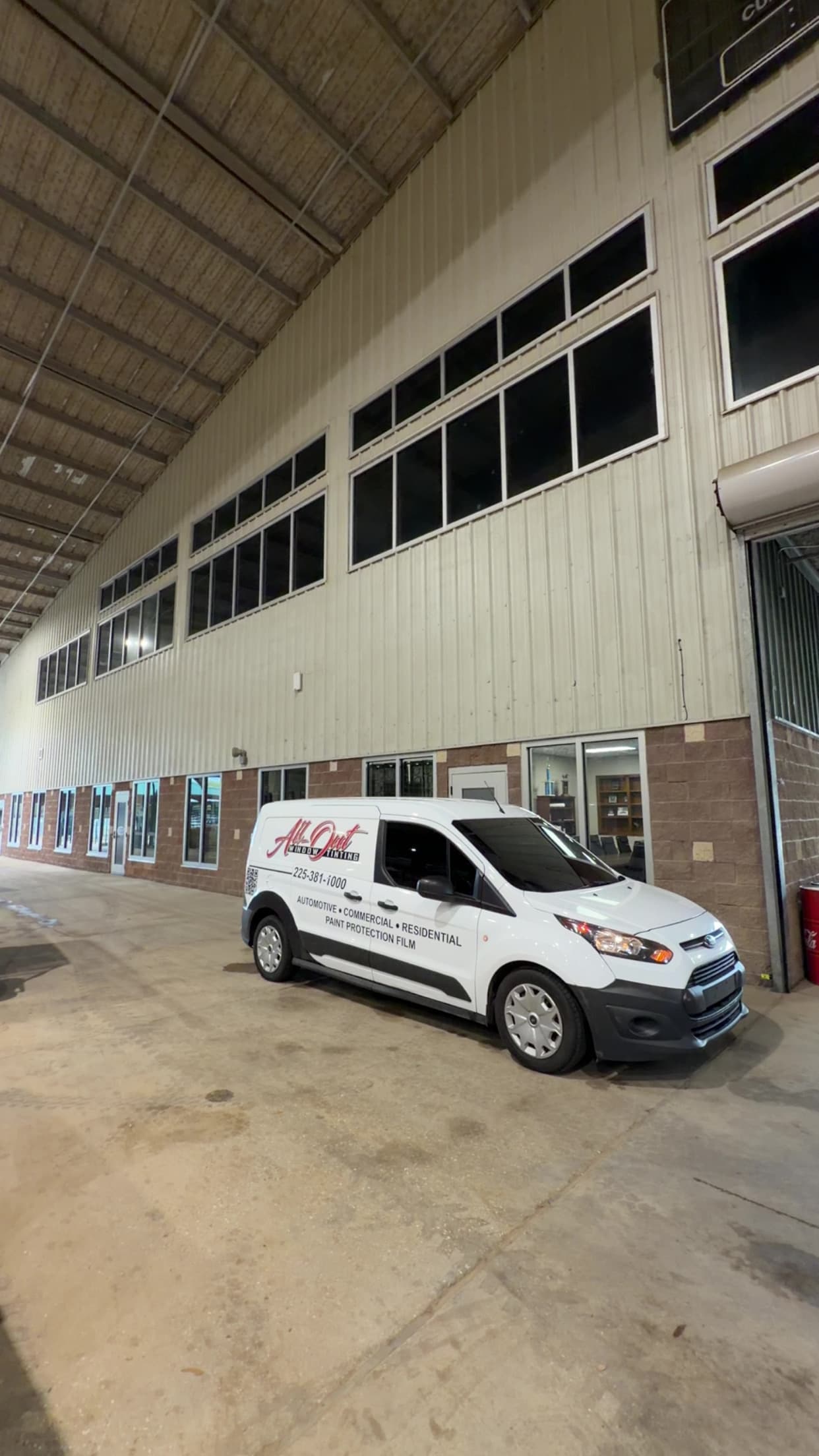 All-Out Window Tint van at commercial job