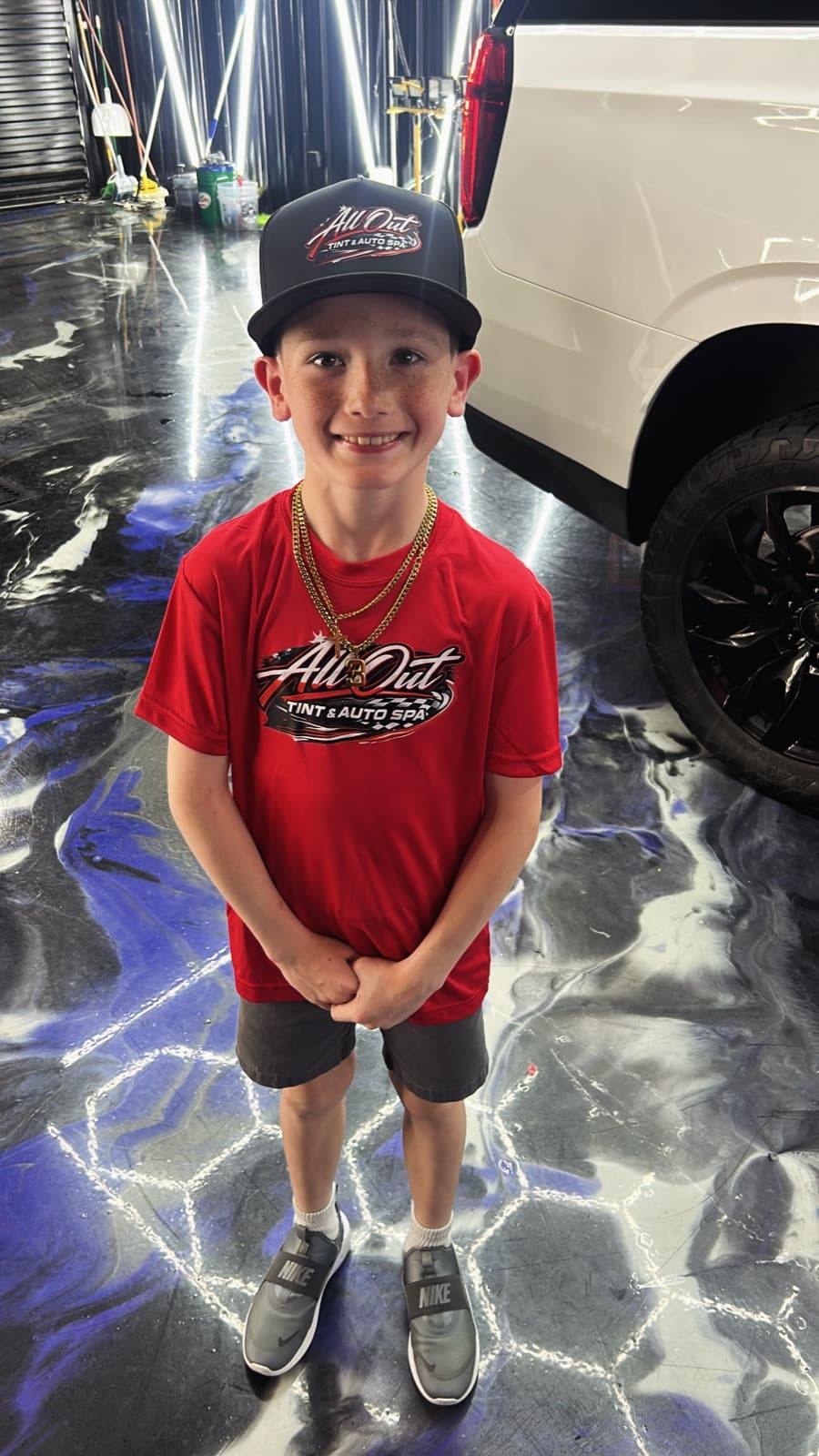 Dax's son at the shop